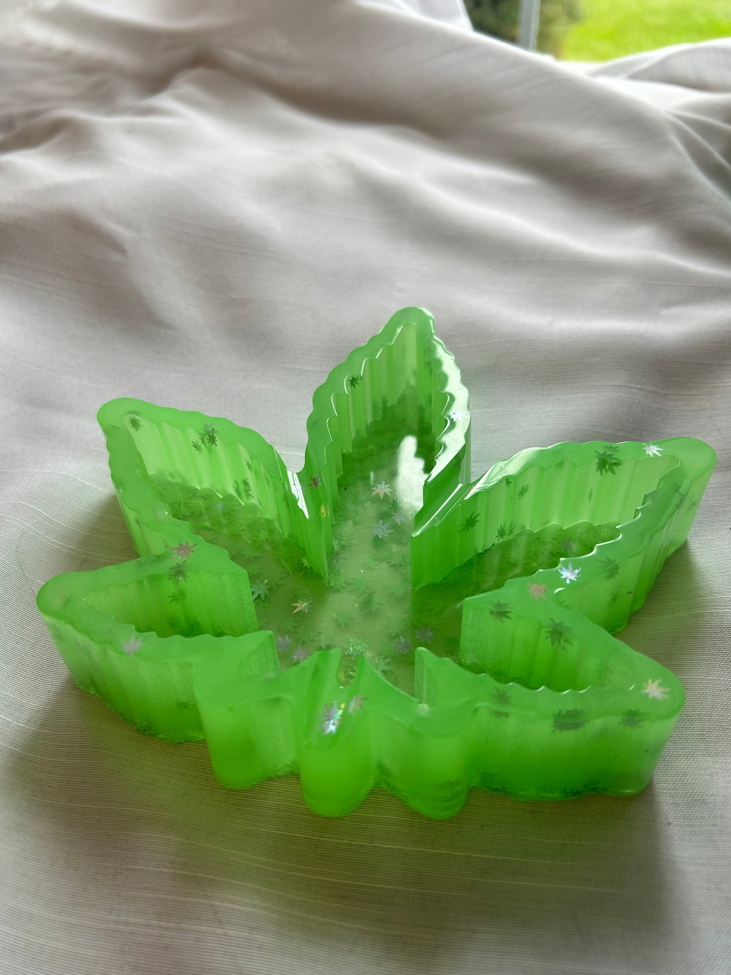 Green sparkle glow in the dark ashtray